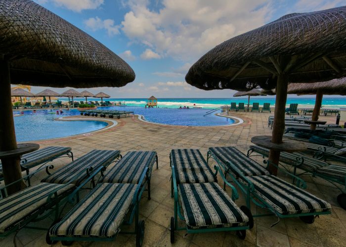 Relax by the resort pool with ocean view at Soledad de Graciano Sánchez in Mexico.